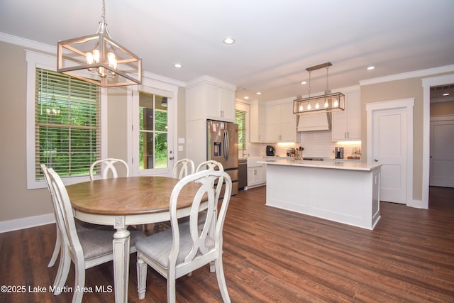 120 Rocky Creek Dr, Alexander City, AL 35010 - dining area with a chandelier, ornamental molding, recessed lighting, and dark wood-style flooring