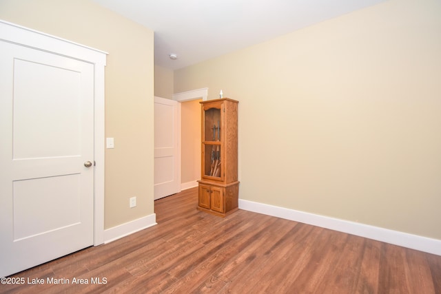 120 Rocky Creek Dr, Alexander City, AL 35010 - spare room featuring wood finished floors and baseboards