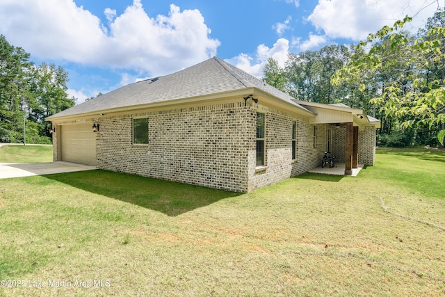 120 Rocky Creek Dr, Alexander City, AL 35010 - view of property exterior with a garage, brick siding, a lawn, and concrete driveway