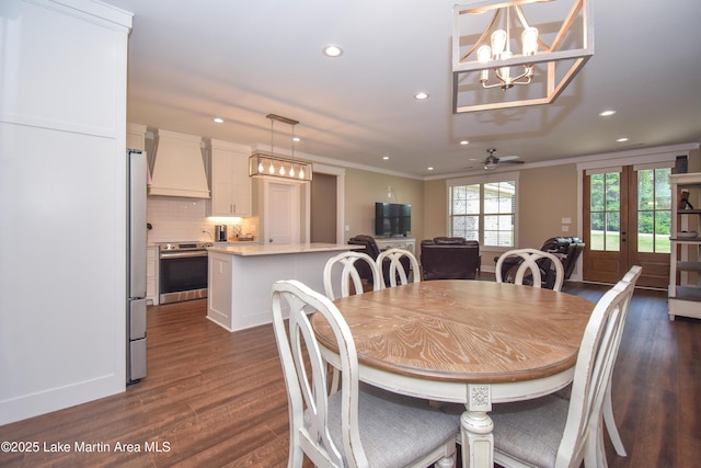 120 Rocky Creek Dr, Alexander City, AL 35010 - dining room with dark wood finished floors, recessed lighting, a chandelier, ornamental molding, and ceiling fan