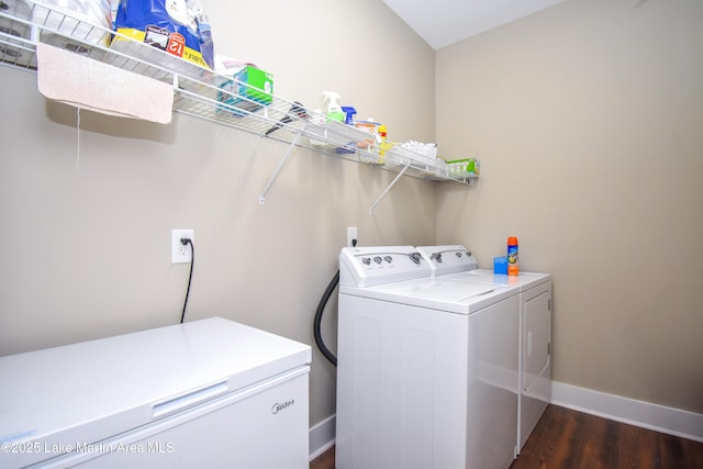 120 Rocky Creek Dr, Alexander City, AL 35010 - laundry room featuring washing machine and clothes dryer and dark wood finished floors