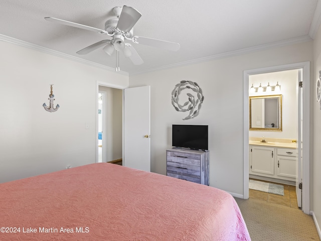 bedroom featuring sink, crown molding, ceiling fan, and ensuite bathroom