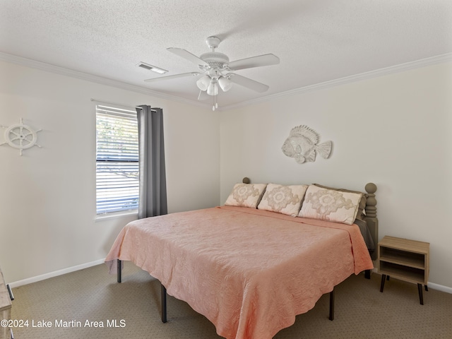 bedroom featuring crown molding, ceiling fan, carpet floors, and a textured ceiling