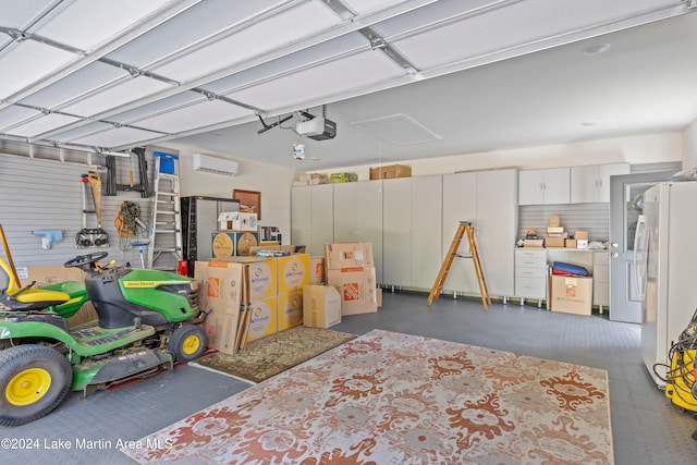 garage featuring white refrigerator, a garage door opener, and a wall mounted AC