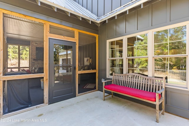 property entrance featuring a patio area