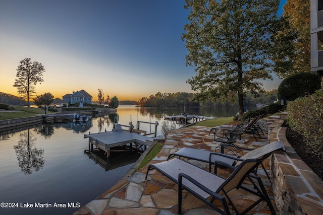 dock area featuring a water view