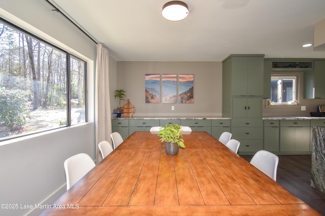 dining space featuring wood finished floors