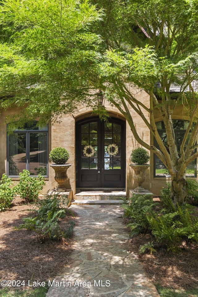 doorway to property featuring french doors