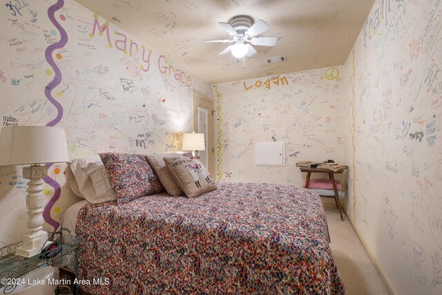 carpeted bedroom featuring ceiling fan