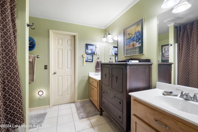 bathroom with tile patterned floors, vanity, and ornamental molding