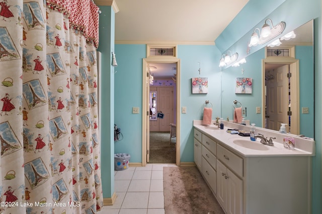 bathroom featuring tile patterned floors, vanity, a shower with curtain, and crown molding