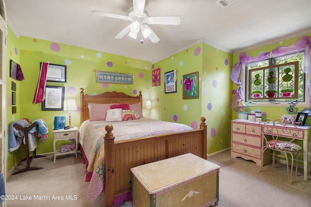 bedroom featuring ceiling fan, light colored carpet, and ornamental molding