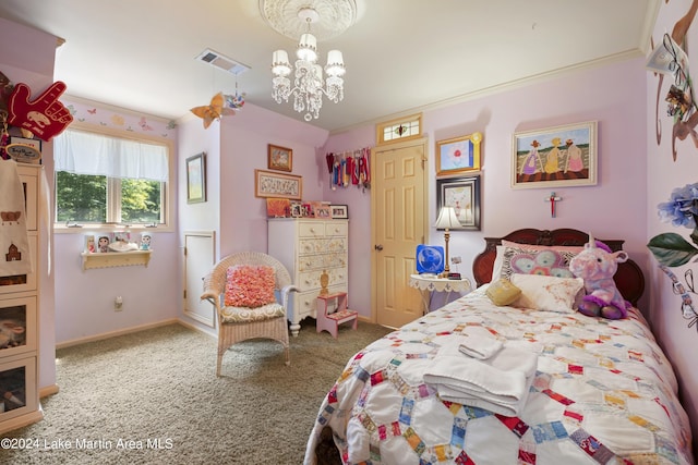 carpeted bedroom featuring a notable chandelier