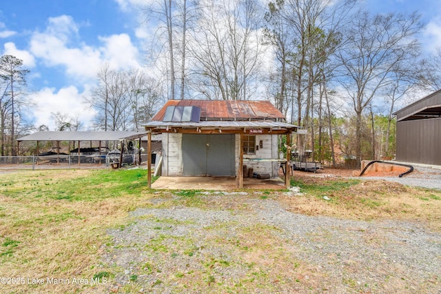 exterior space featuring a carport