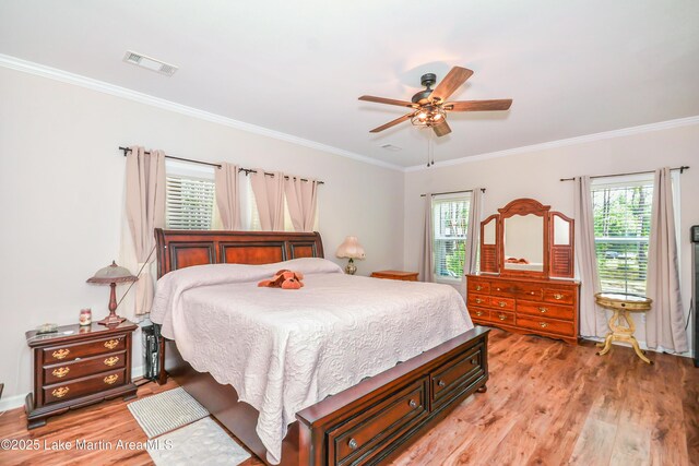 4869 County Road 2225, Troy, AL 36079 - bedroom featuring light wood finished floors, crown molding, and a ceiling fan