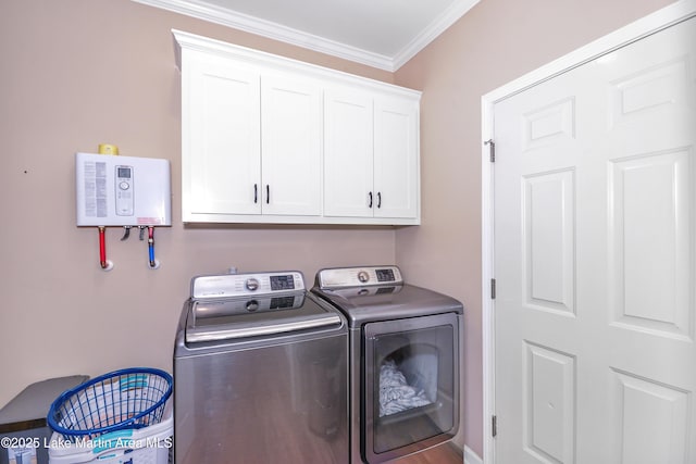 4869 County Road 2225, Troy, AL 36079 - clothes washing area featuring washer and clothes dryer, cabinet space, and ornamental molding