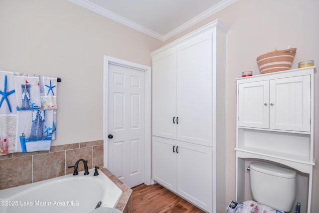 4869 County Road 2225, Troy, AL 36079 - full bathroom with a bath, crown molding, toilet, and wood finished floors