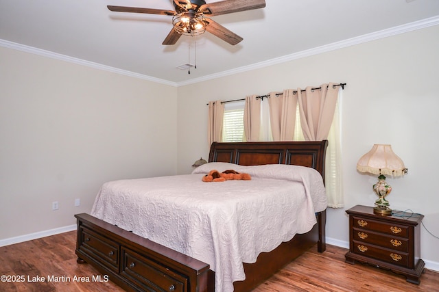 4869 County Road 2225, Troy, AL 36079 - bedroom with wood finished floors, ornamental molding, baseboards, and a ceiling fan