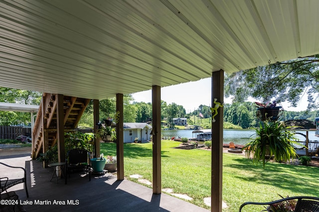 view of patio / terrace featuring a water view