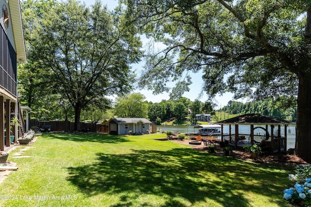 view of yard with a gazebo and an outbuilding