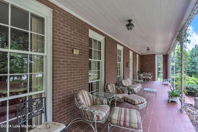 view of patio featuring a porch