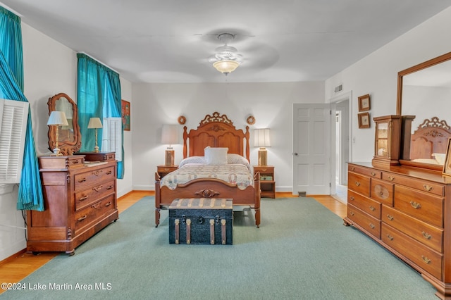 bedroom featuring ceiling fan and light wood-type flooring