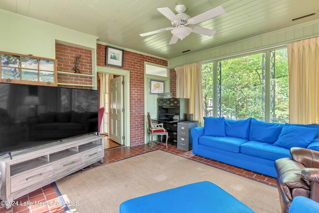 tiled living room featuring ceiling fan, wooden ceiling, and crown molding