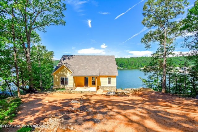 272 River Ridge Rd, Alexander City, AL 35010 - chalet / cabin with a water view, a shingled roof, and stone siding