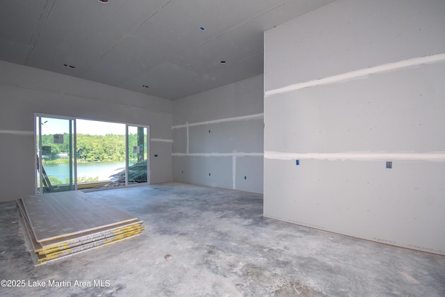 272 River Ridge Rd, Alexander City, AL 35010 - spare room with unfinished concrete flooring