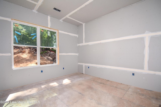 272 River Ridge Rd, Alexander City, AL 35010 - empty room with unfinished concrete floors