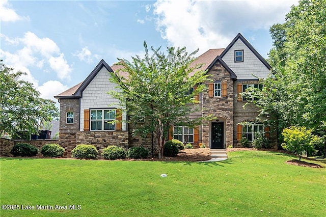 craftsman-style home featuring a front yard