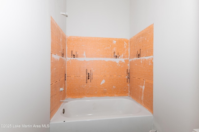 full bath featuring a tub