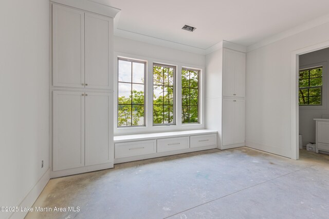 interior space featuring visible vents and concrete flooring