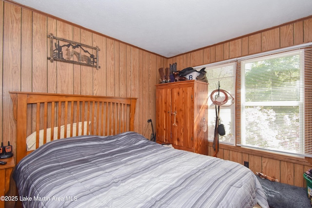 230 Lorena Dr, Alexander City, AL 35010 - bedroom with wood walls and ornamental molding
