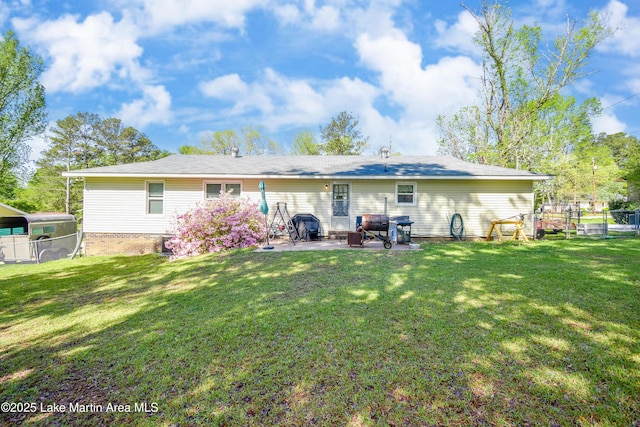 230 Lorena Dr, Alexander City, AL 35010 - back of house with a patio area, fence, and a yard