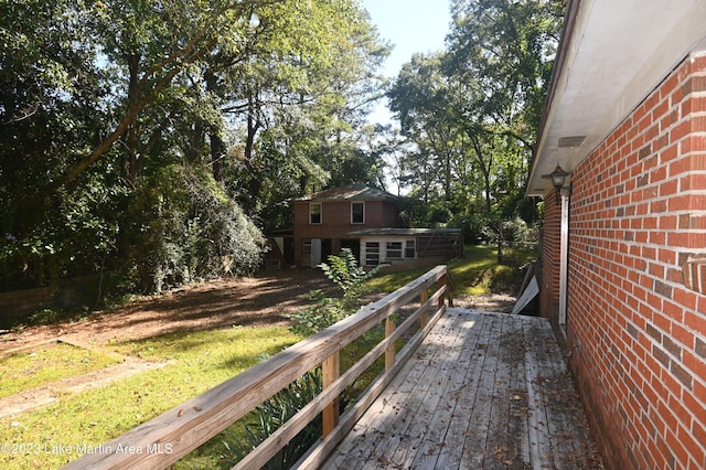 view of yard with a wooden deck