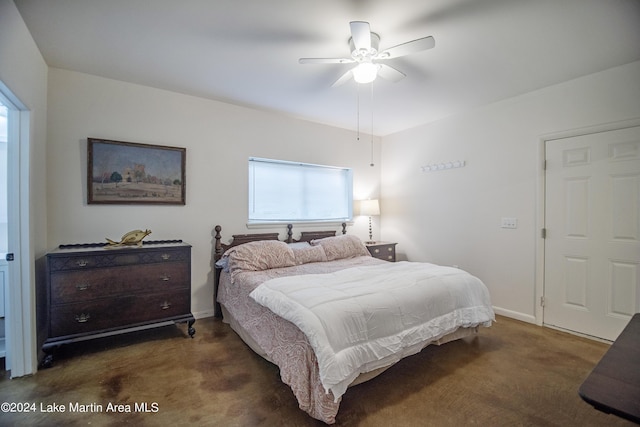 carpeted bedroom with ceiling fan