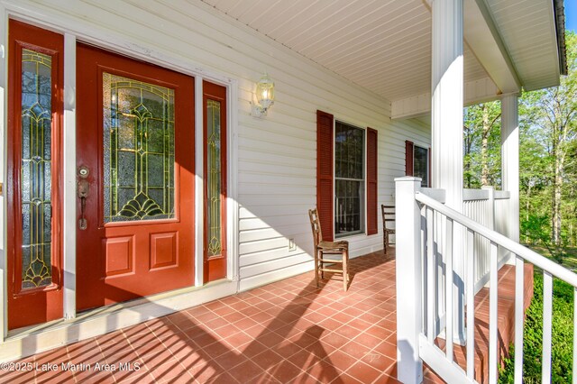 1647 Timber Trl, Alexander City, AL 35010 - view of exterior entry featuring a porch