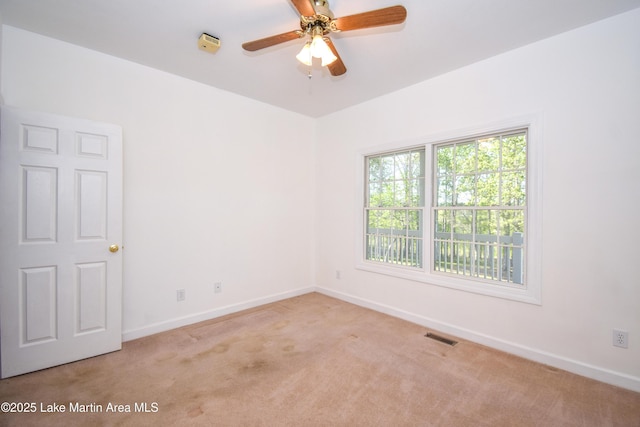 1647 Timber Trl, Alexander City, AL 35010 - unfurnished room with visible vents, baseboards, carpet floors, and ceiling fan