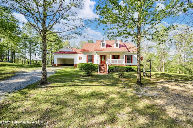 1647 Timber Trl, Alexander City, AL 35010 - new england style home featuring stairs, an attached garage, driveway, a porch, and a front yard