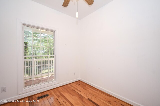 1647 Timber Trl, Alexander City, AL 35010 - empty room featuring light wood-type flooring, visible vents, a ceiling fan, and baseboards