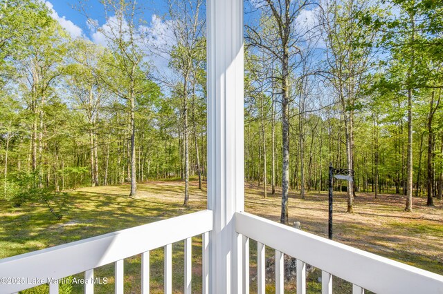 1647 Timber Trl, Alexander City, AL 35010 - balcony featuring a forest view