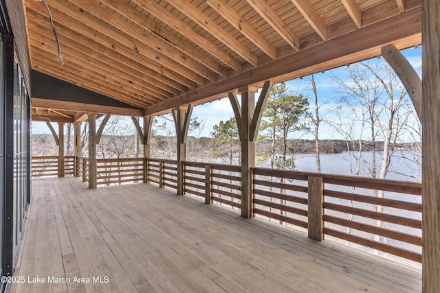 wooden deck featuring a water view