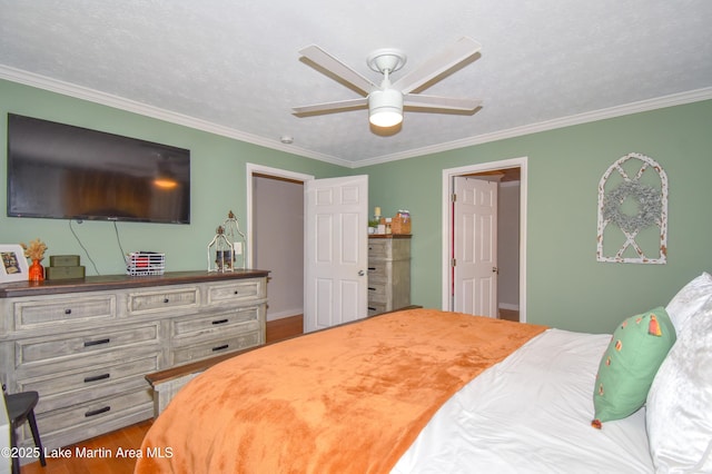 241 Warrior Rd, Alexander City, AL 35010 - bedroom with a ceiling fan, wood finished floors, and crown molding