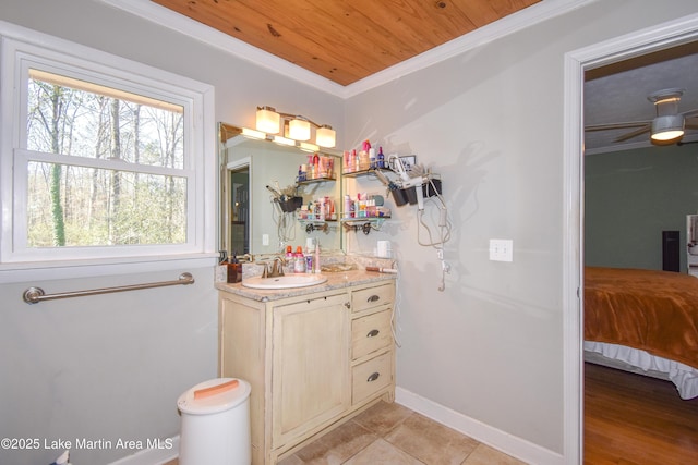 241 Warrior Rd, Alexander City, AL 35010 - bathroom with crown molding, baseboards, wooden ceiling, tile patterned floors, and vanity