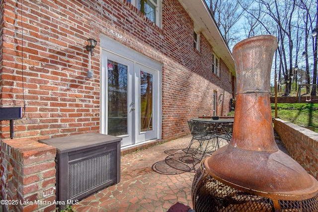 241 Warrior Rd, Alexander City, AL 35010 - view of patio featuring french doors and outdoor dining area