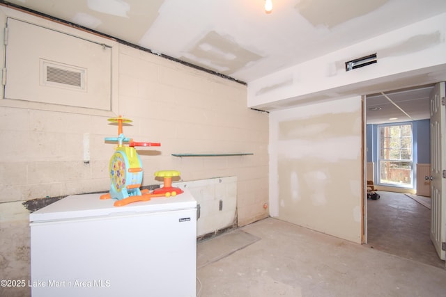 241 Warrior Rd, Alexander City, AL 35010 - laundry area with laundry area, washer and dryer, and concrete block wall