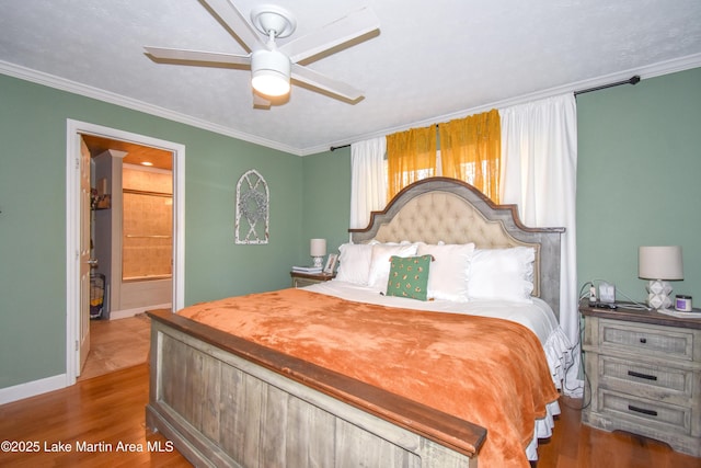 241 Warrior Rd, Alexander City, AL 35010 - bedroom featuring ceiling fan, baseboards, wood finished floors, and ornamental molding