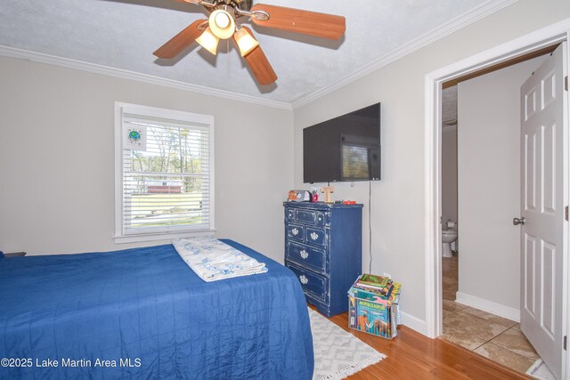 241 Warrior Rd, Alexander City, AL 35010 - bedroom featuring ceiling fan, wood finished floors, baseboards, and ornamental molding