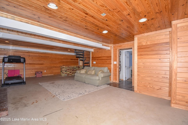 241 Warrior Rd, Alexander City, AL 35010 - unfurnished living room with recessed lighting, wooden walls, concrete floors, and wooden ceiling